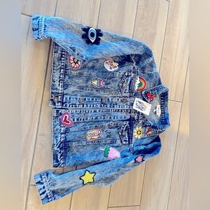 Jean jacket with patches. Girls size 14